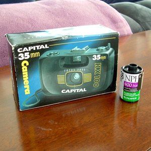 Capital KX100 Point-and-Shoot 35mm Camera w/box, booklets and 1 roll Fuji NPH.